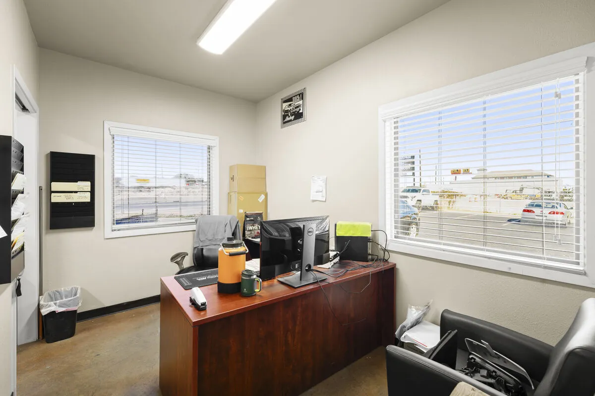 Expert technician working on vehicle panel alignment